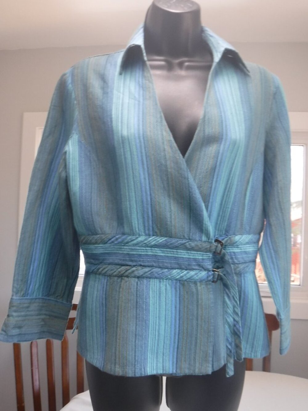 Stunning cross over shirt with fine and unusual features made of linen and rayon